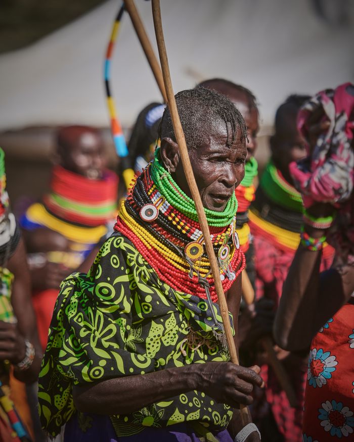 Vibrant African tribal gathering with traditional attire and cultural expressions.